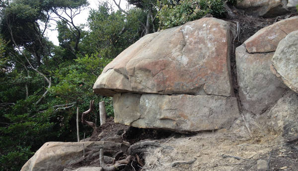 Is the curiously shaped summit stone man-made?